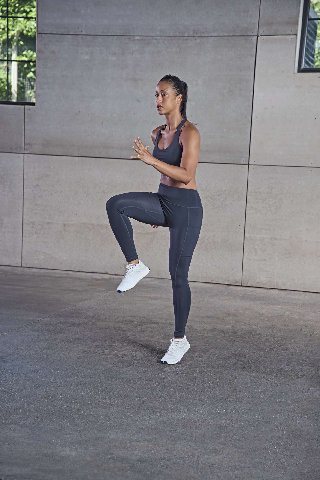 Hoch geschnittene Leggings mit Handytasche